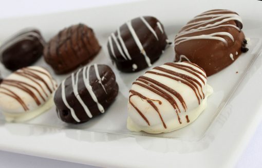 Chocolate Dipped Alfajor Cookies